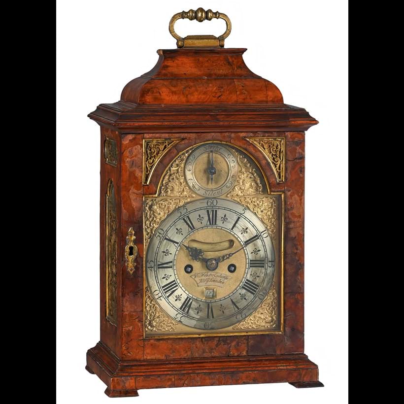 Inline Image - Lot 187: A fine George II gilt brass mounted walnut table/bracket clock with pull-quarter repeat on six bells, William Webster, London, circa 1730 | Est. £4,000-6,000 (+ fees)