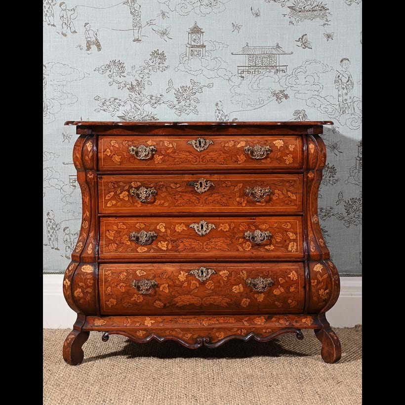 Inline Image - Lot 232: A Dutch walnut and floral marquetry inlaid commode, early 19th century | Est. £300-500 (+ fees)