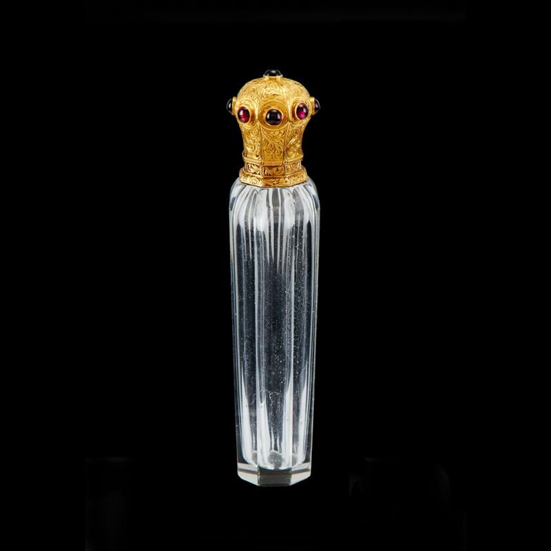 A French gold mounted clear glass scent bottle, mid/late 19th century 