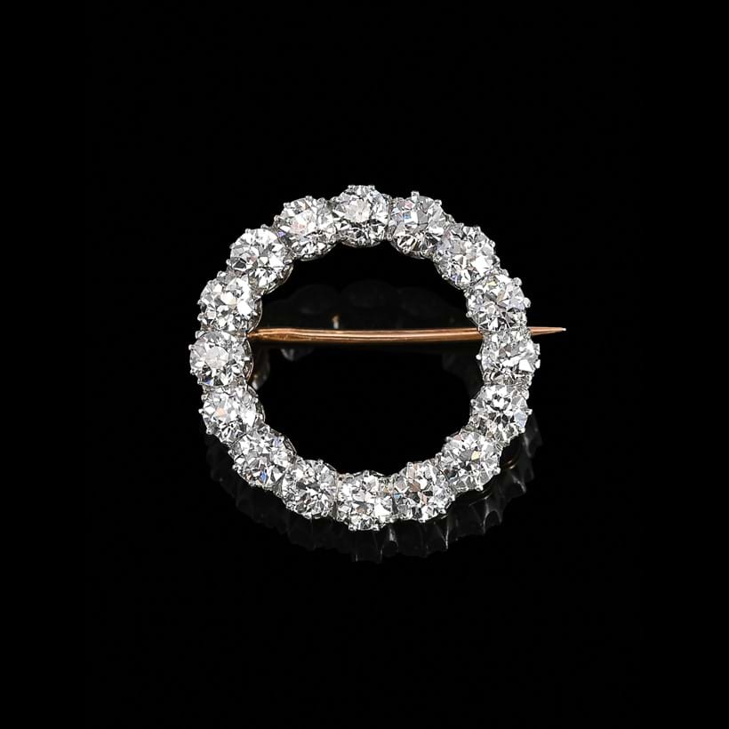 Inline Image - Lot 280: Tiffany & Co., a mid 20th century diamond circlet brooch | Est. £3,000-5,000 (+ fees)