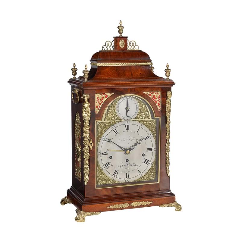 A fine George III brass mounted mahogany quarter-striking table clock 