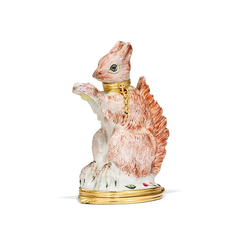 A gold-mounted ‘Girl in the Swing’ porcelain scent-bottle modelled as a squirrel, circa 1755