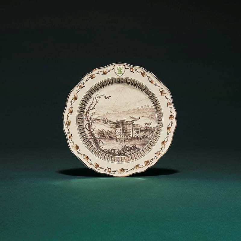 A Wedgwood and Bentley creamware plate from 'The Frog Service' made for Catherine the Great