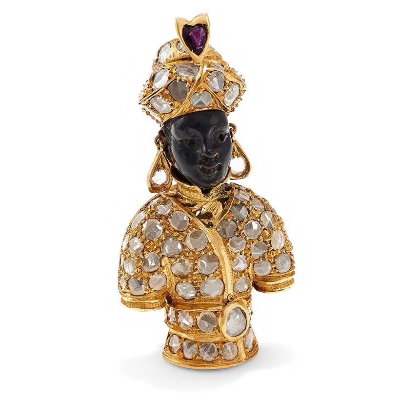 Inline Image - Lot 36: Nardi, a diamond, tortoiseshell and garnet 'Moretto' brooch | Sold for £7,812