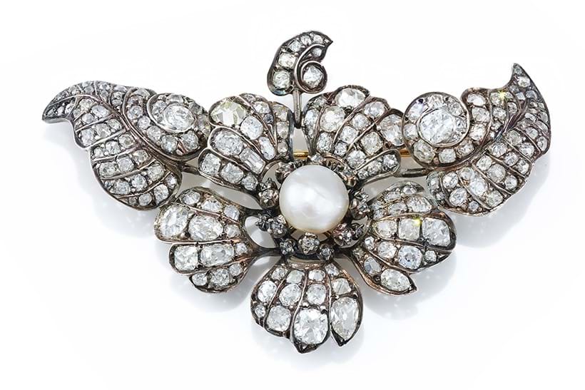 Inline Image - Lot 102: A late 19th century pearl and diamond flower brooch circa 1890 | Sold for £5,292