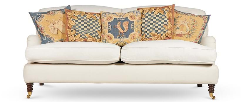 Inline Image - Lot 106: A pair of upholstered sofas in the manner of Howard & Sons, 20th century | Est. £3,000-5,000 (+ fees)