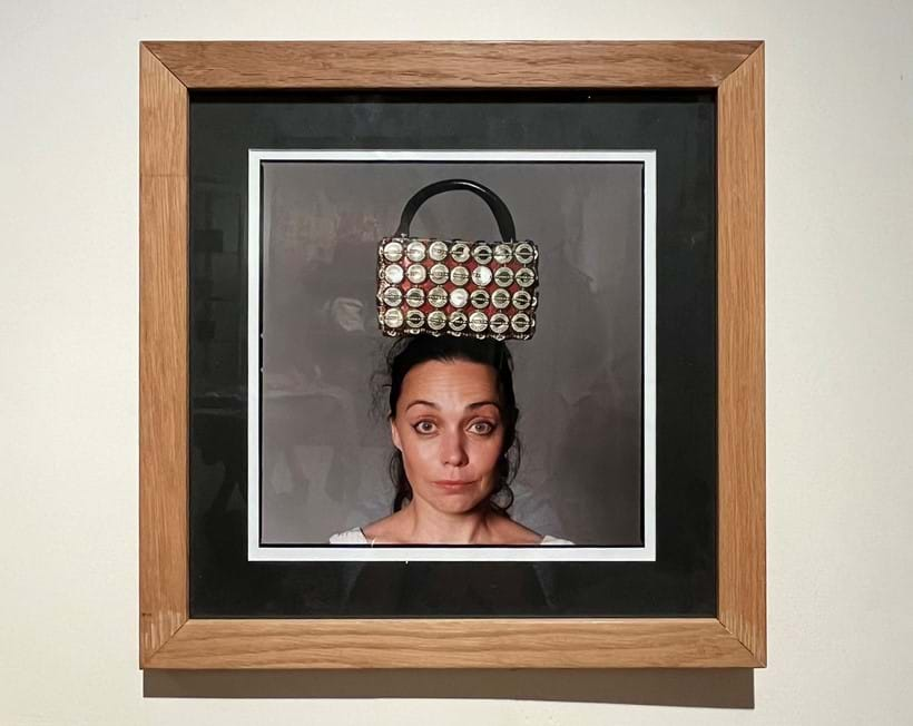 Inline Image - A photo of Jeanne Marine Geldof with a Bottletop bag on her head, taken by David Bailey who shot the whole campaign | Included in Lot 262, along with a selection of Mulberry bottletop accessories from the Mulberry 'Bottletop' campaign | Est. £150-250 (+ fees)