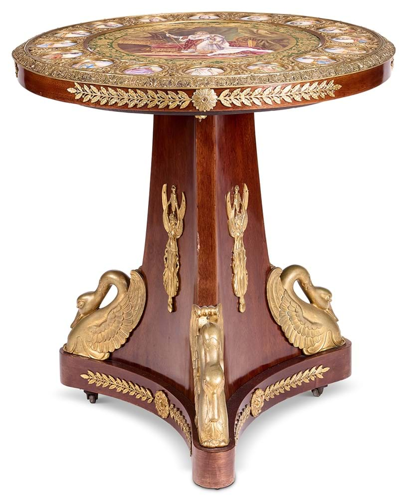 Inline Image - Lot 108:  A Sevres-style pottery, pressed gilt metal and mahogany centre table, late 19th century | Est. £6,000-8,000 (+ fees)