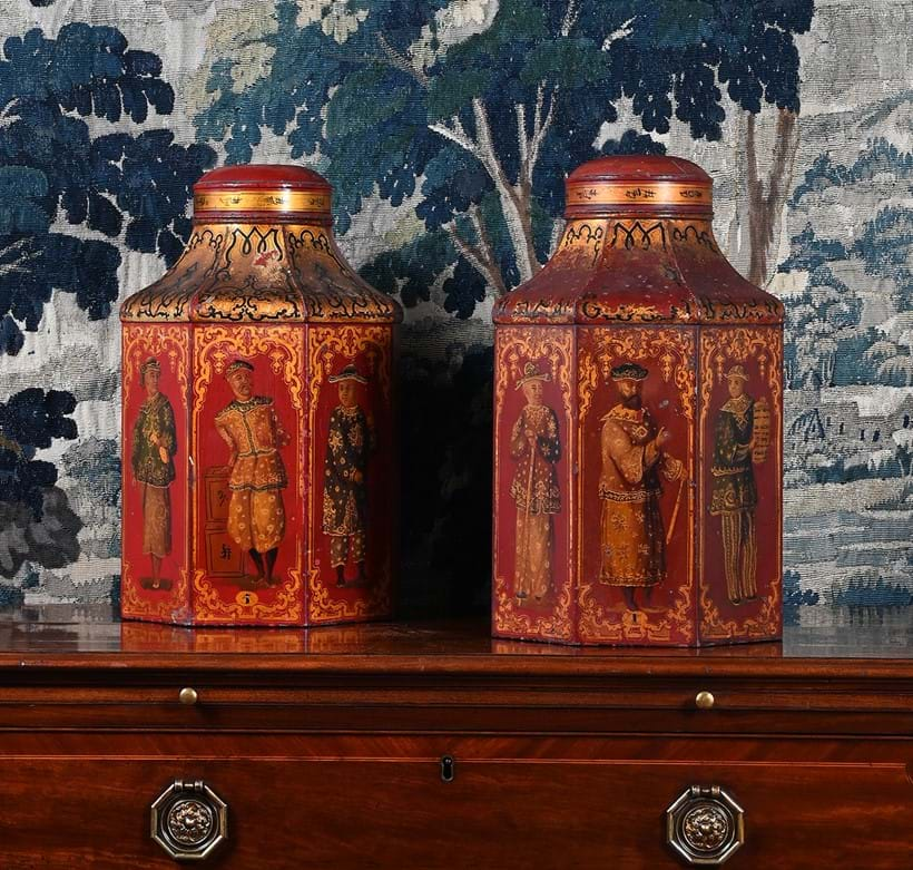 Inline Image - Lot 252: A pair of Victorian red and gilt tole tea cannisters, by G Sutcliffe, Manchester, 19th century | Est. £2,000-3,000 (+ fees)