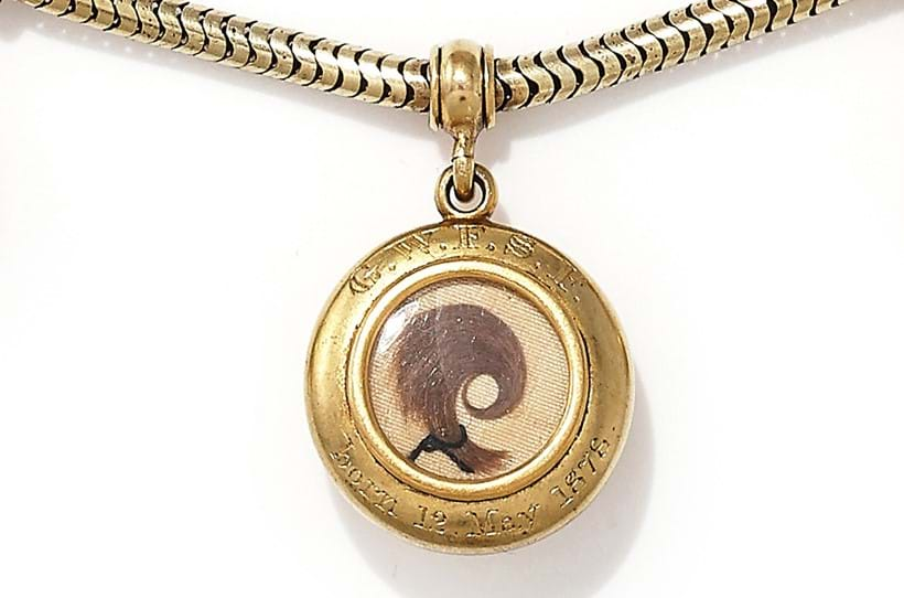 Inline Image - Each locket features a lock of hair for each child in a glazed compartment to the reverse, engraved with their initials and dates of birth.