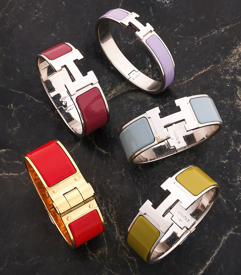 14696 A selection of Hermès Clic Clac bangles.jpg