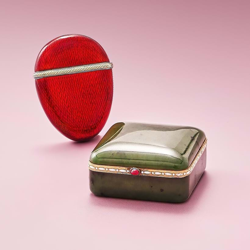 Inline Image - Lot 61: Fabergé, a nephrite, enamel and ruby pill box, workmaster Henrik Wigström, St. Petersburg 1908-1917 | Est. £5,000-8,000 (+ fees) & Lot 62: Fabergé, an imperial silver gilt and red enamel vesta case, workmaster Henrik Wigström, St. Petersburg 1908-1917 | Est. £3,000-5,000 (+ fees)