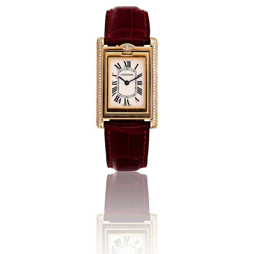 Cartier, Tank Basculante, a lady's 18 carat gold and diamond reversible wrist watch.jpg