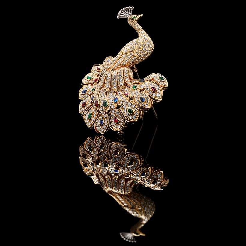 Inline Image - A diamond, sapphire, ruby and emerald peacock brooch by Cartier | Sold for £45,000