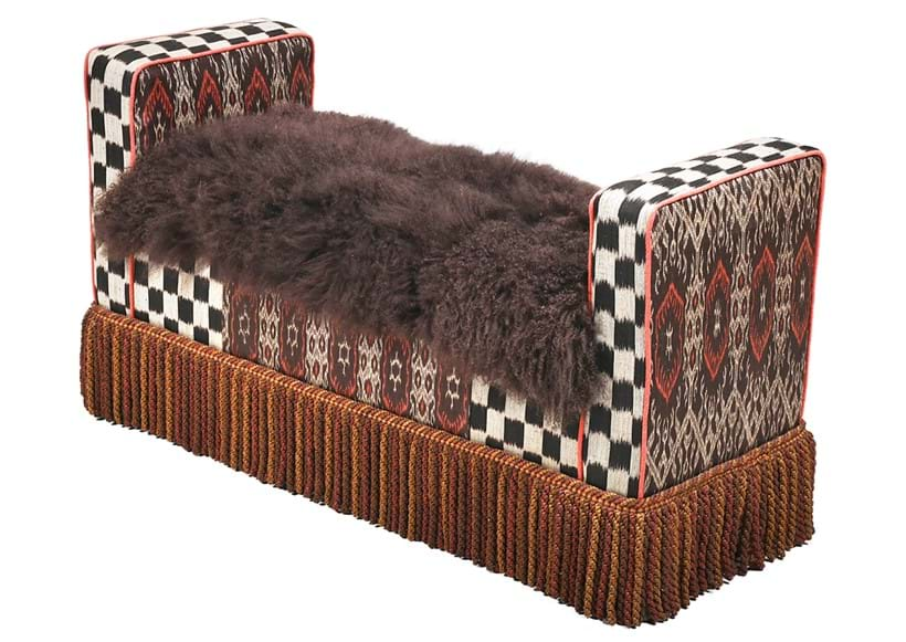 Inline Image - Lot 1: A Mongolian-style bed bench, 20th century and later, re-upholstered in a wool and patterned fabric designed by Tomasz Starzewski, on an original 1930s frame | Est. £800-1,200 (+ fees)