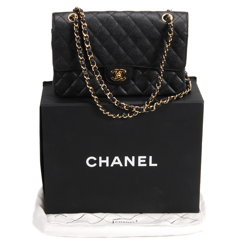 13787 Lot 341 Chanel, a black quilted caviar leather handbag Sold for £2,108.JPG
