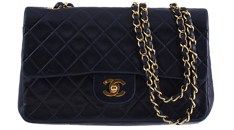 14638 Lot 416 Chanel, classic flap a navy quilted handbag Sold for £2,268.JPG