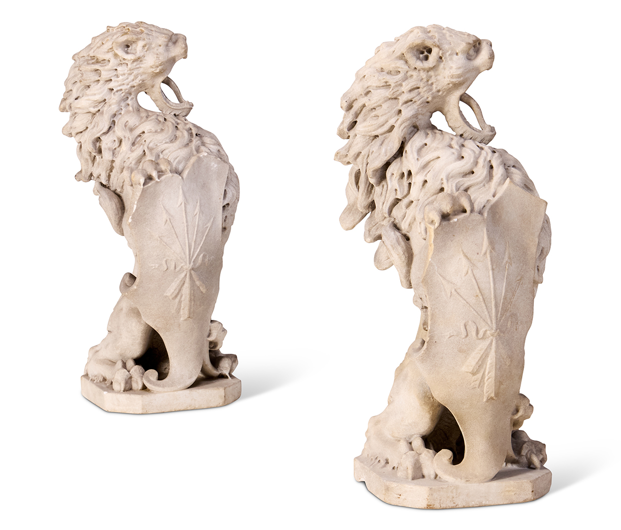 Lot 82 - Melissa Ulfane Collection - A pair of carved marble heraldic or armorial lions Italian, early 19th century.jpg
