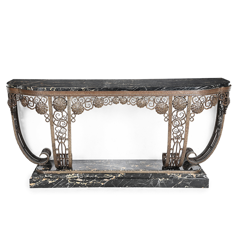 Edgar Brandt (French, 1880-1960) A large console; circa 1930