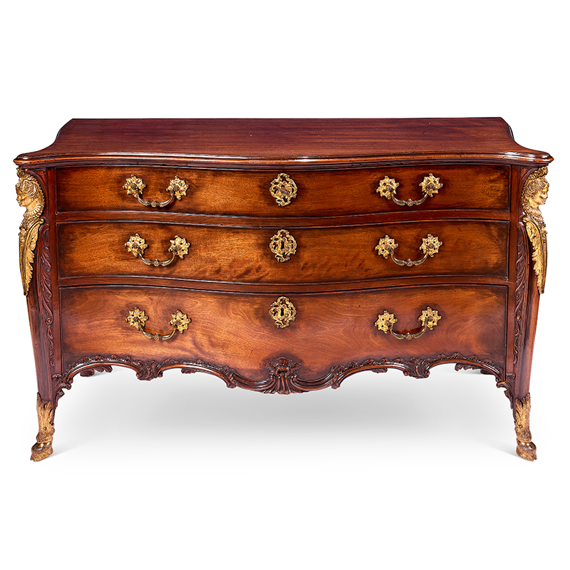 A George III ormolu-mounted mahogany serpentine commode attributed to John Cobb, mid 18th century