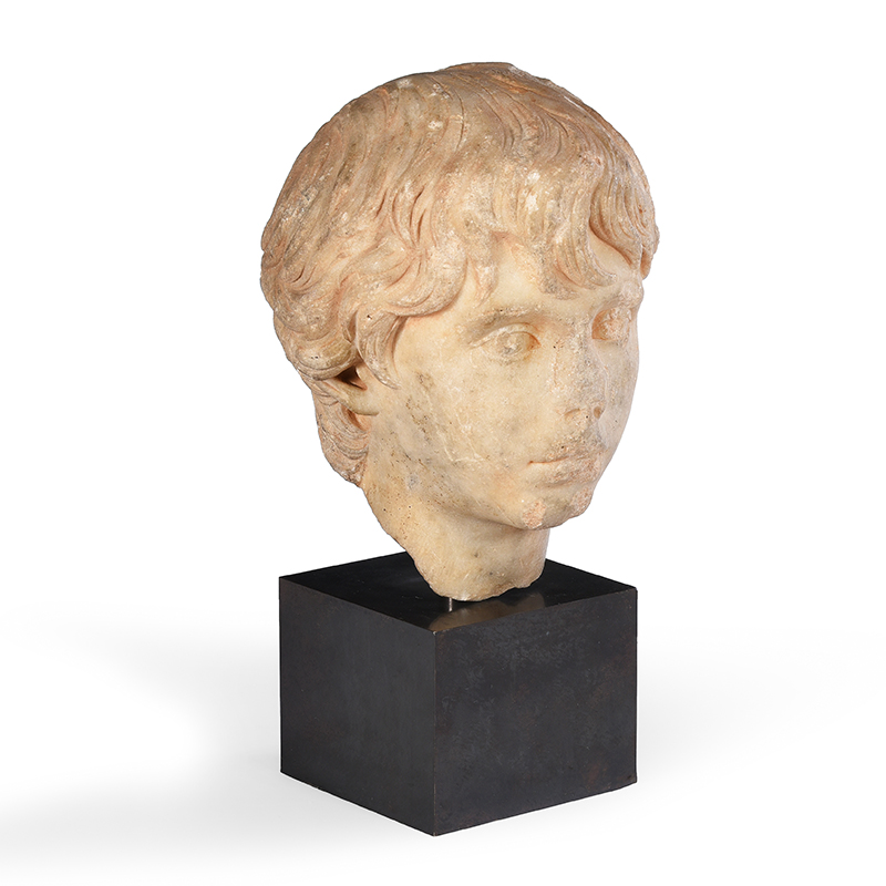 A carved marble portrait head of a youth, probably Polideuce Roman, possibly circa 170-177 AD