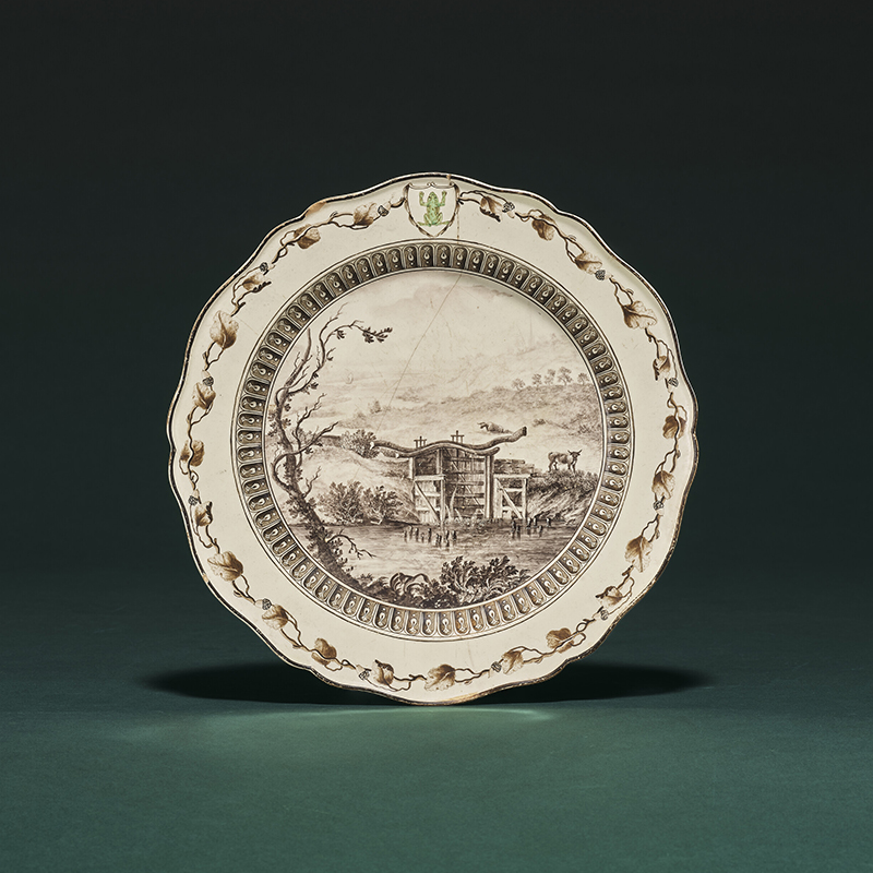 A Wedgwood and Bentley creamware plate from 'the frog service' made for Catherine The Great 1773-4