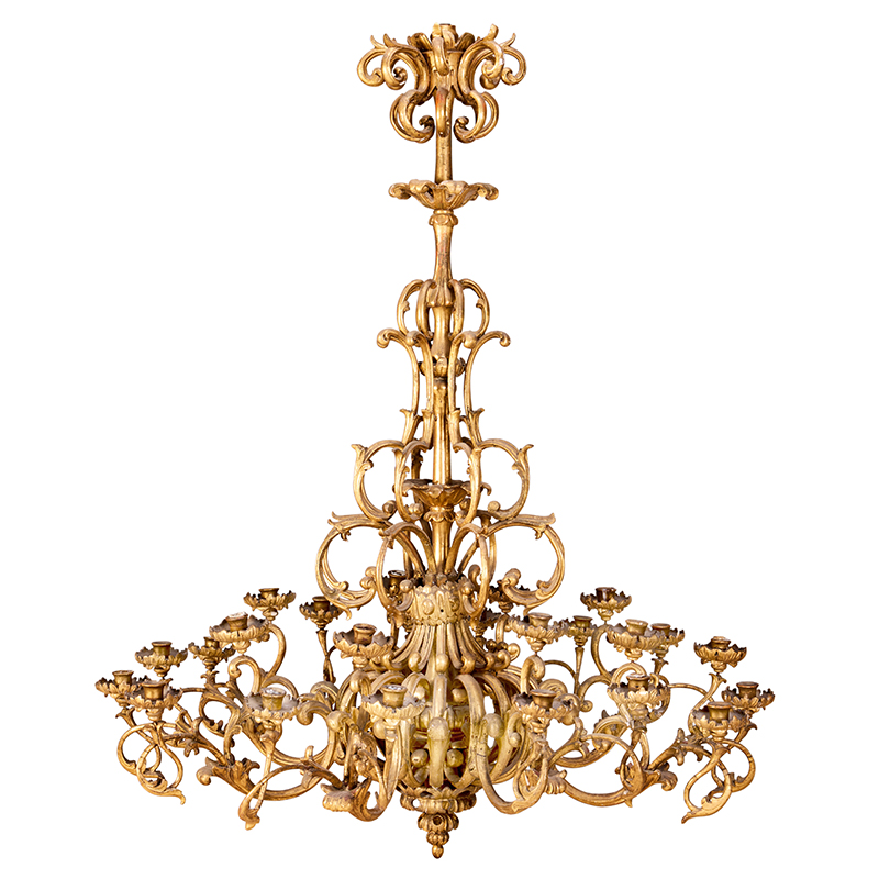 A large 18th century Italian baroque giltwood twenty four light chandelier