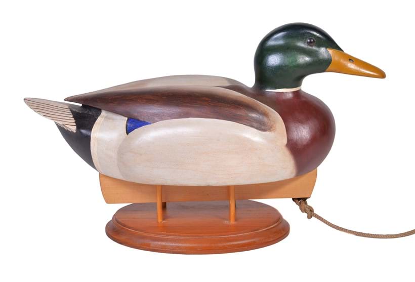 Inline Image - Alan Emmett (1938-2008), a modern carved and painted wood model of a duck decoy, signed and dated to the underside 'ALAN EMMETT Feb 2006' | Sold for £400