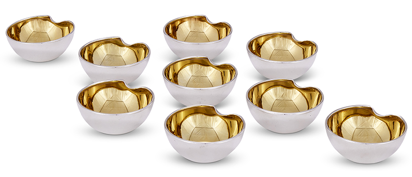14404 Lot 265 - Nine Italian Silver Thumbprint Salt Cellars, Elsa Peretti for Tiffany & Co. import marked for London 2002 Sold for £3,250. 820w.jpg