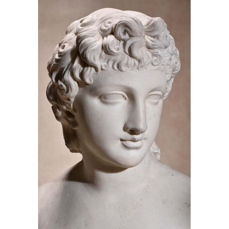 A continental white marble bust of a youthful apollo, late 18th/early 19th century