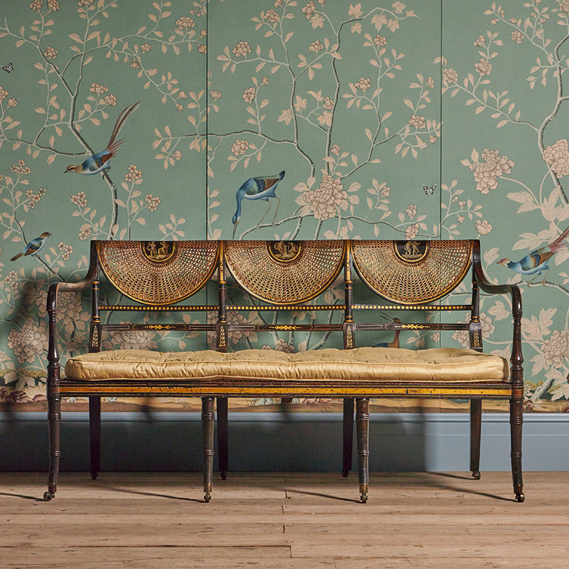 A Regency simulated rosewood, parcel gilt and painted chair back settee circa 1815