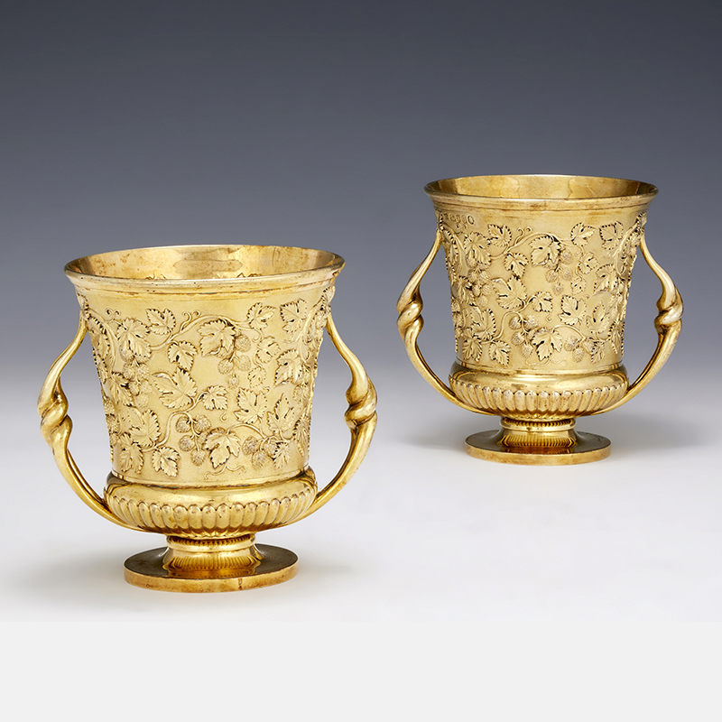 A pair of late George III silver gilt twin handled cups Paul Storr, London 1817