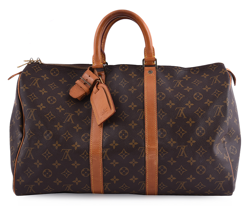 14638 Lot 423 Louis Vuitton, a coated canvas and leather travel bag Sold for £756.JPG