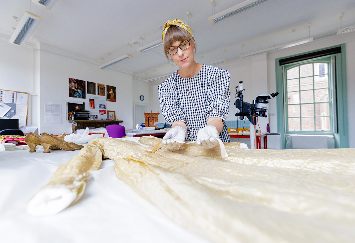 The wedding outfit of the Hon. Ursula Mary Lawley underwent meticulous conservation at Historic Royal Palaces.jpg