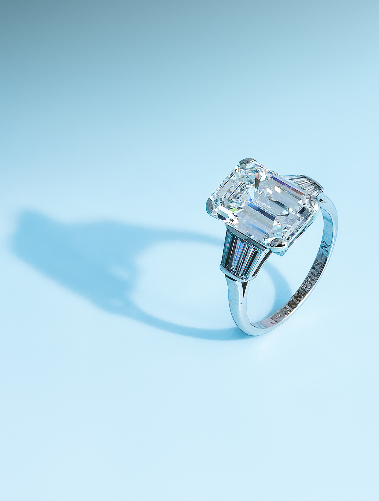A diamond single stone ring set with an emerald cut diamond (Lot 366).jpg