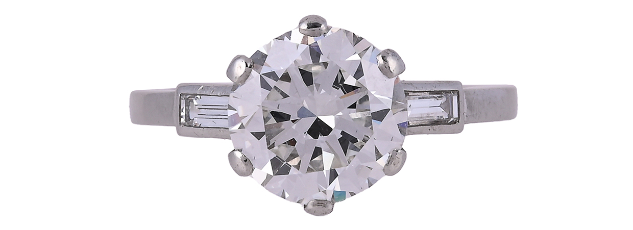A single stone brilliant cut diamond ring, London 1993, weighing 3.08 carats.jpg