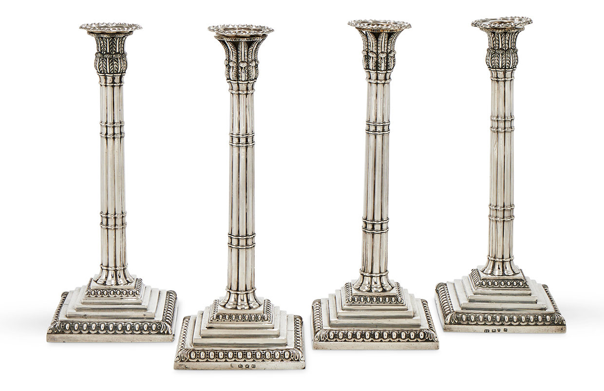 Lot 118 - Two matched pairs of George III silver 'tea' candlesticks, one pair by John Carter, London 1771, the other by George Ashforth & Co.,.jpg