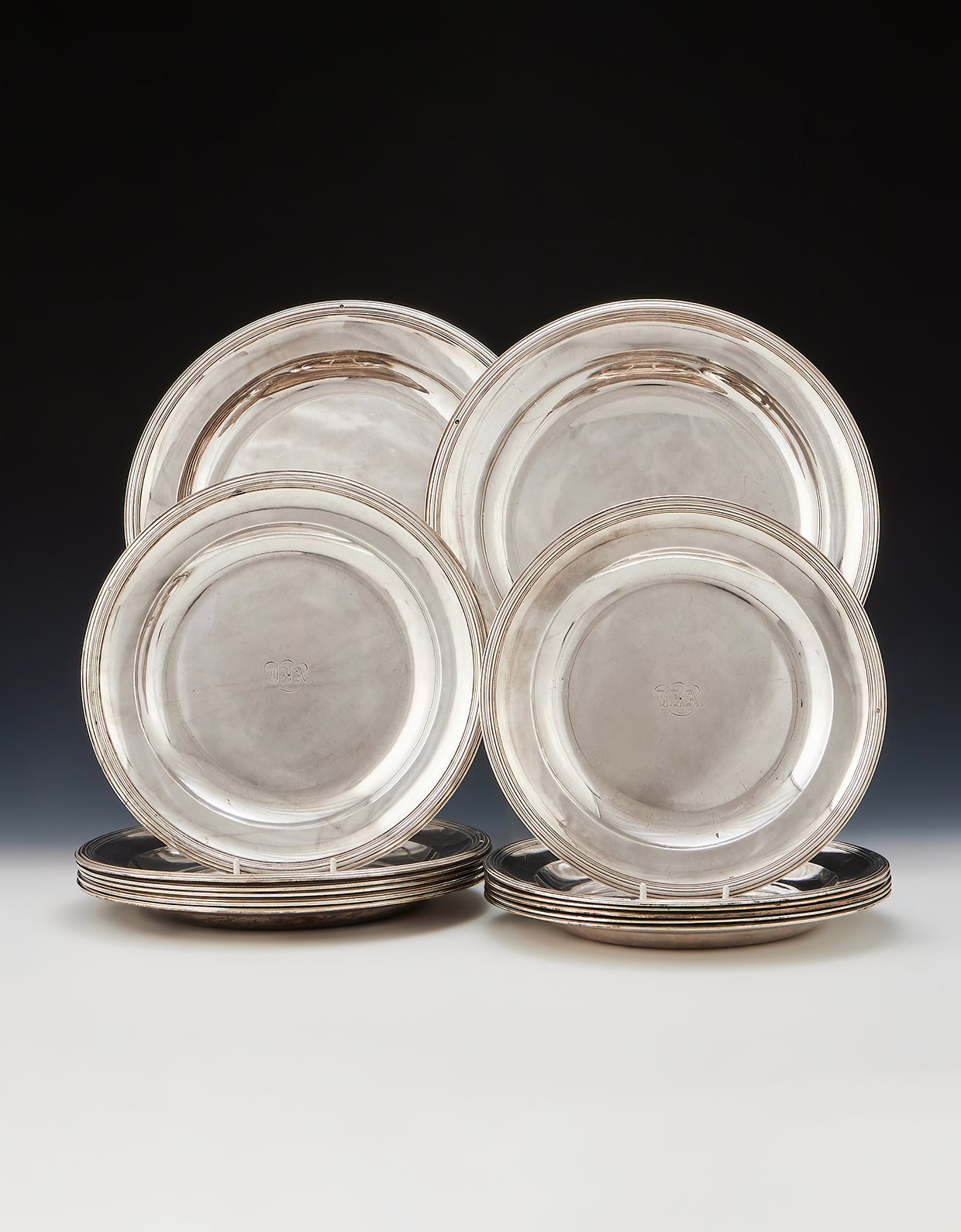 Lot 372 - A set of fourteen French Empire silver plates, Jacques-Henri Fauconnier, Paris 1819 - 1838, .950 Standard.jpg