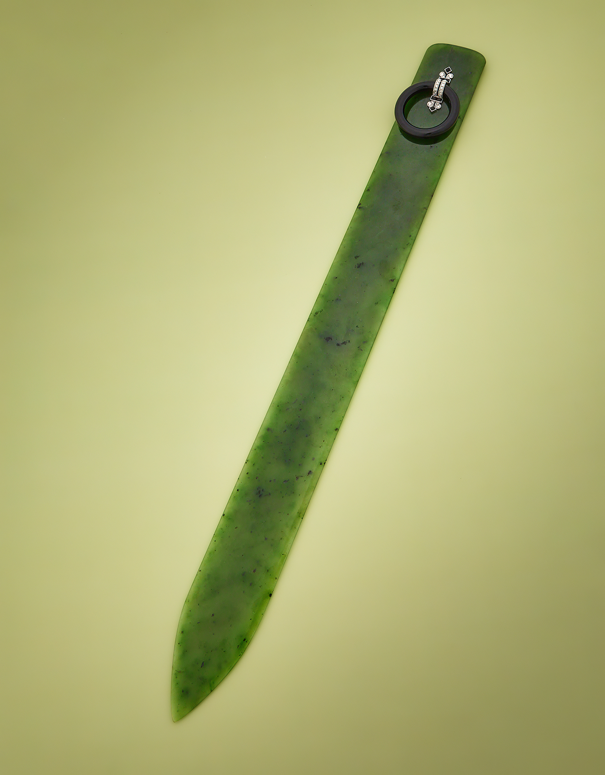 Lot 390 - A French Art Deco nephrite, onyx and diamond paper knife, Henri Lavabre, Paris, circa 1920-1925.jpg