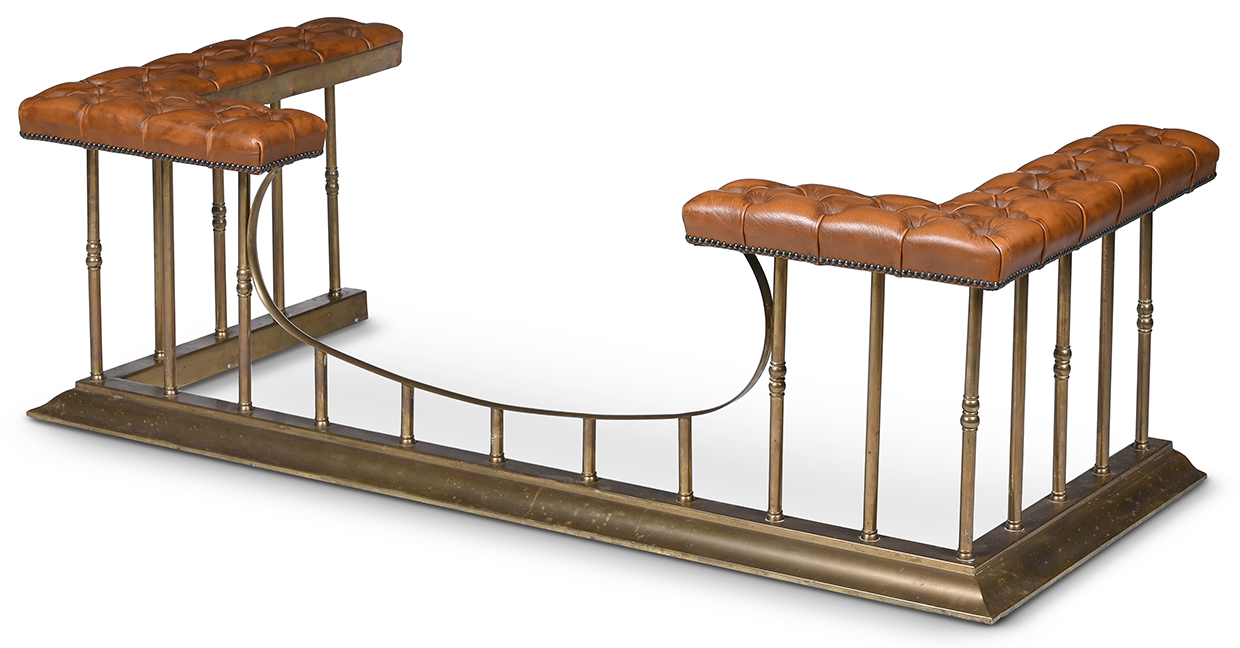 Lot 185 - A BRASS AND BROWN LEATHER BUTTON UPHOLSTERED CLUB FENDER.jpg