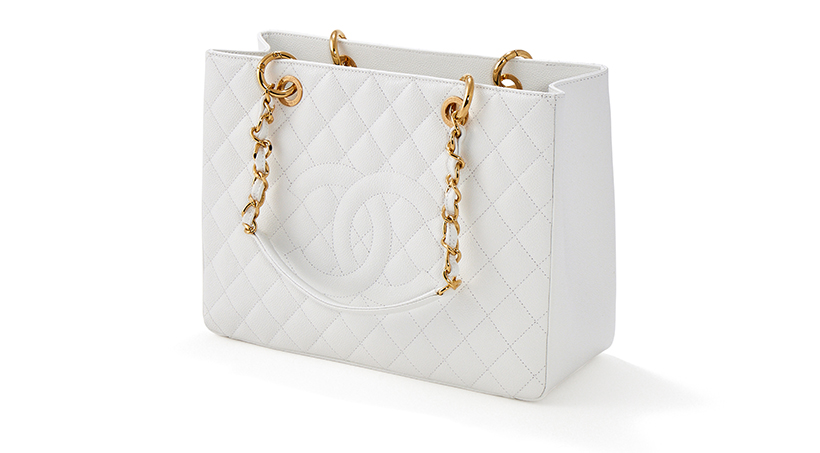 14810 Lot 315 Chanel, grand shopping tote a white caviar lambskin tote Sold for £4,445.jpg