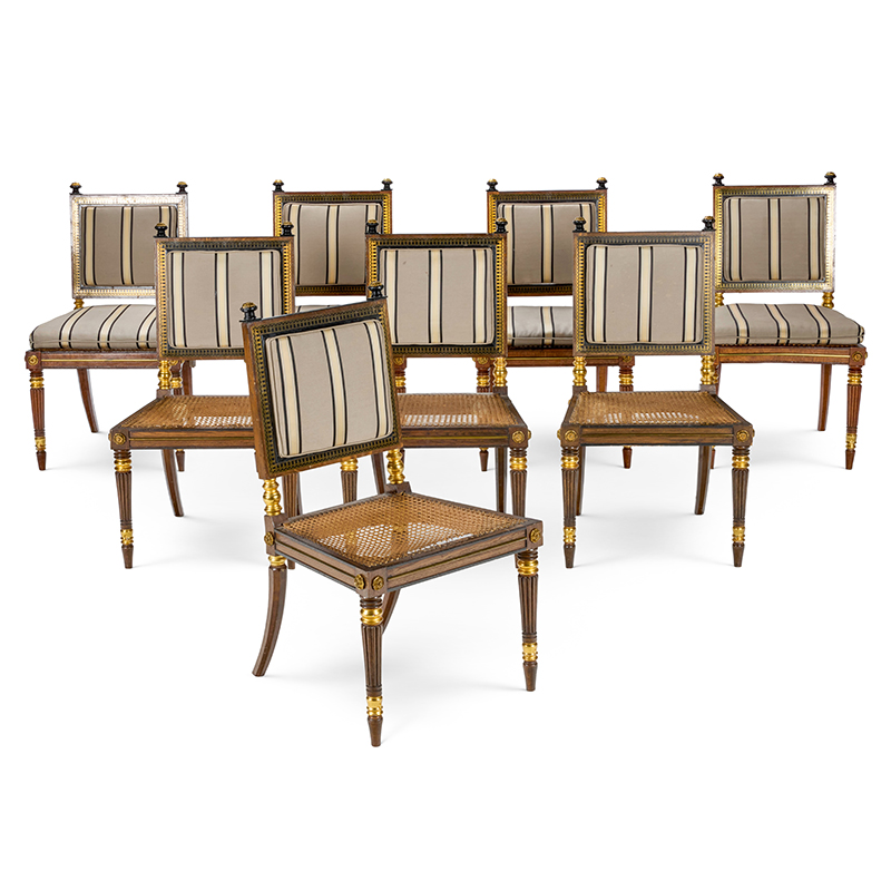 A set of eight oak, ebonised, parcel gilt and brass marquetry chairs, four circa 1815