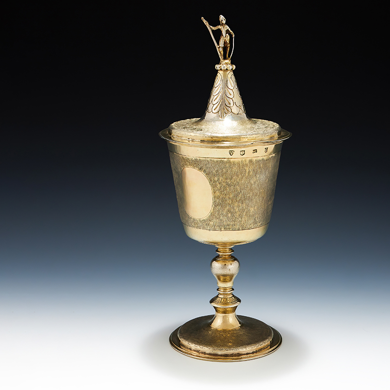 A Commonwealth silver gilt standing cup and cover maker's mark WM over four balls arranged in a shield, London 1650