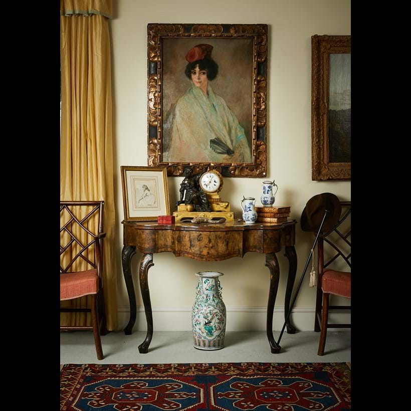 Inline Image - Interior from Oakley House featuring one of a near pair of North Italian walnut and olivewood serpentine side tables, mid-18th century
Provenance: Tyntesfield: Est. £5,000-8,000 (+ fees)