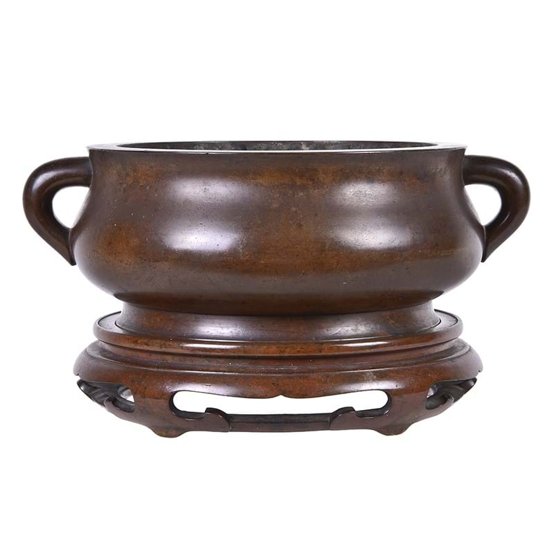 A Chinese bronze bombe censer and stand