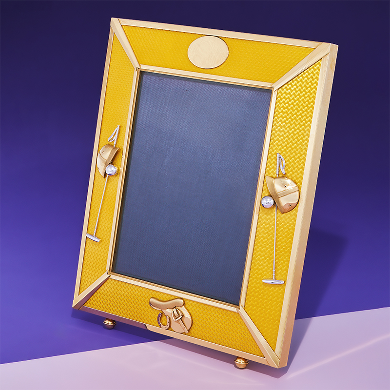 Asprey & Co. Ltd. an 18 carat gold mounted photo frame, London 1998
