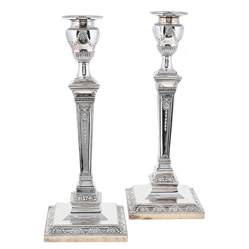 A pair of Victorian silver candlesticks, Hawksworth, Eyre & Co. Ltd., Sheffield 1895