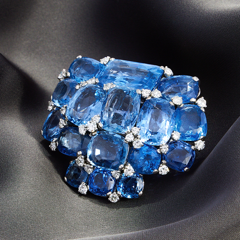 Cartier, a sapphire and diamond cluster clip brooch circa 1935