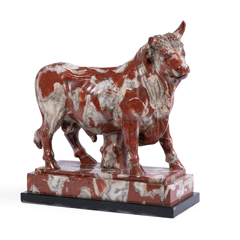 After the Antique- a Rouge Languedoc marble figure of a bull attributed to Franzoni