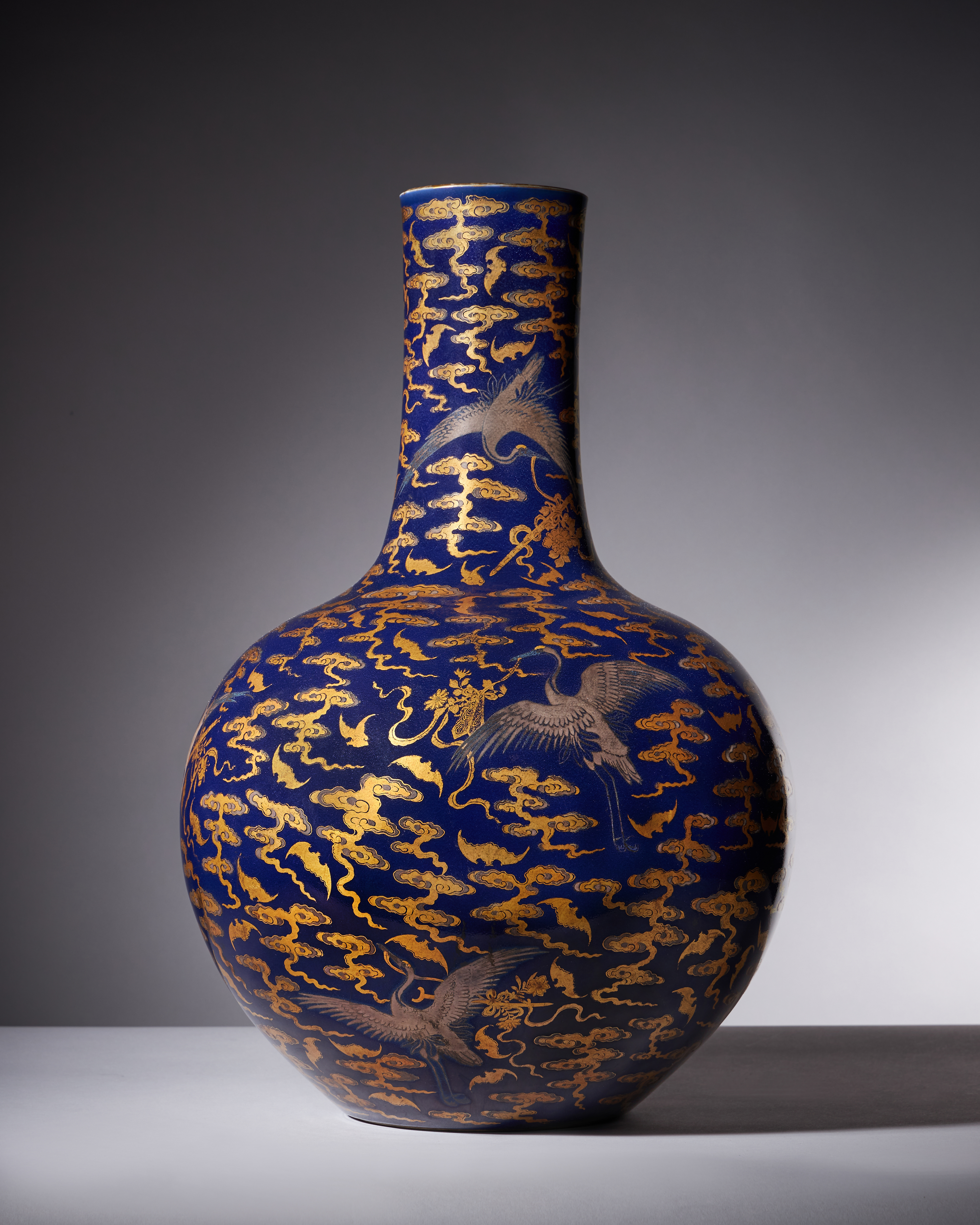 A Magnificent Chinese Imperial blue-glazed silver and gilt 'Bat and Crane' vase, Tianqiuping, seal mark and period of Qianlong